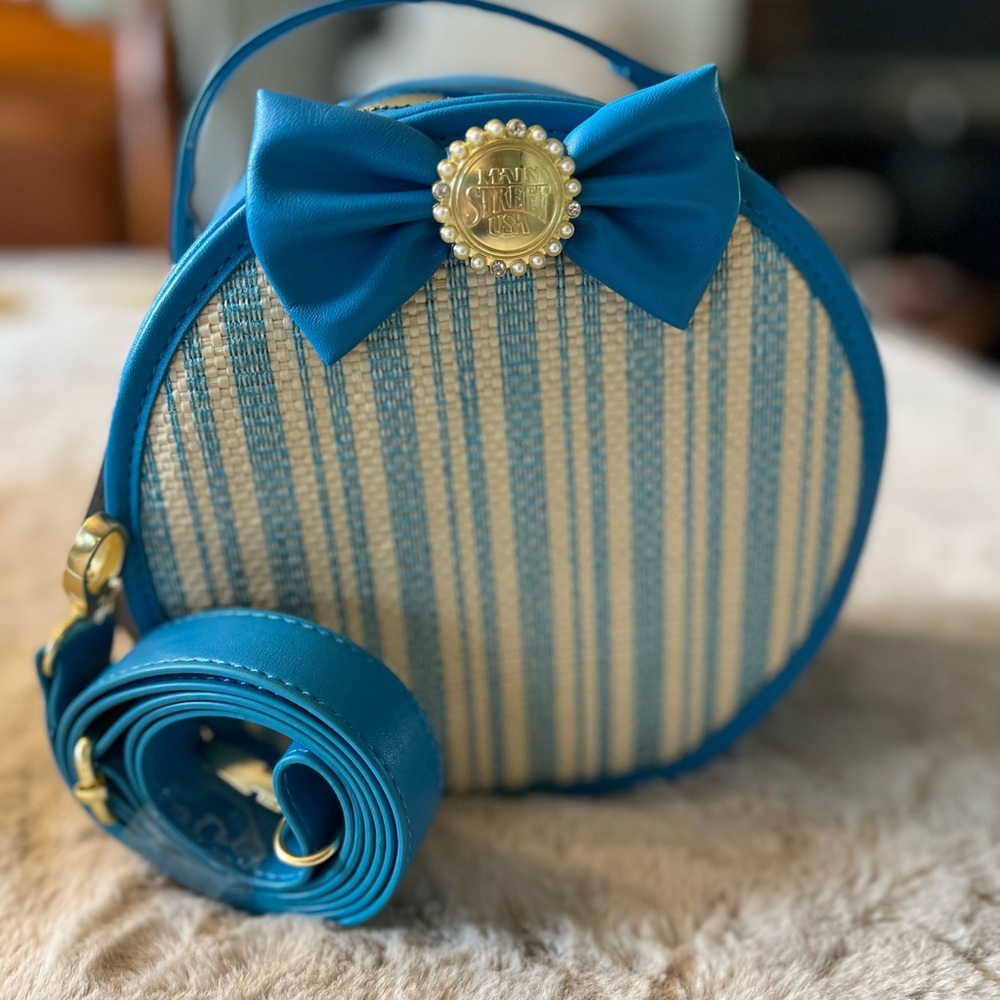 Disney Dapper Dan Main Street Round Crossbody Blue Cream NWT Collectible